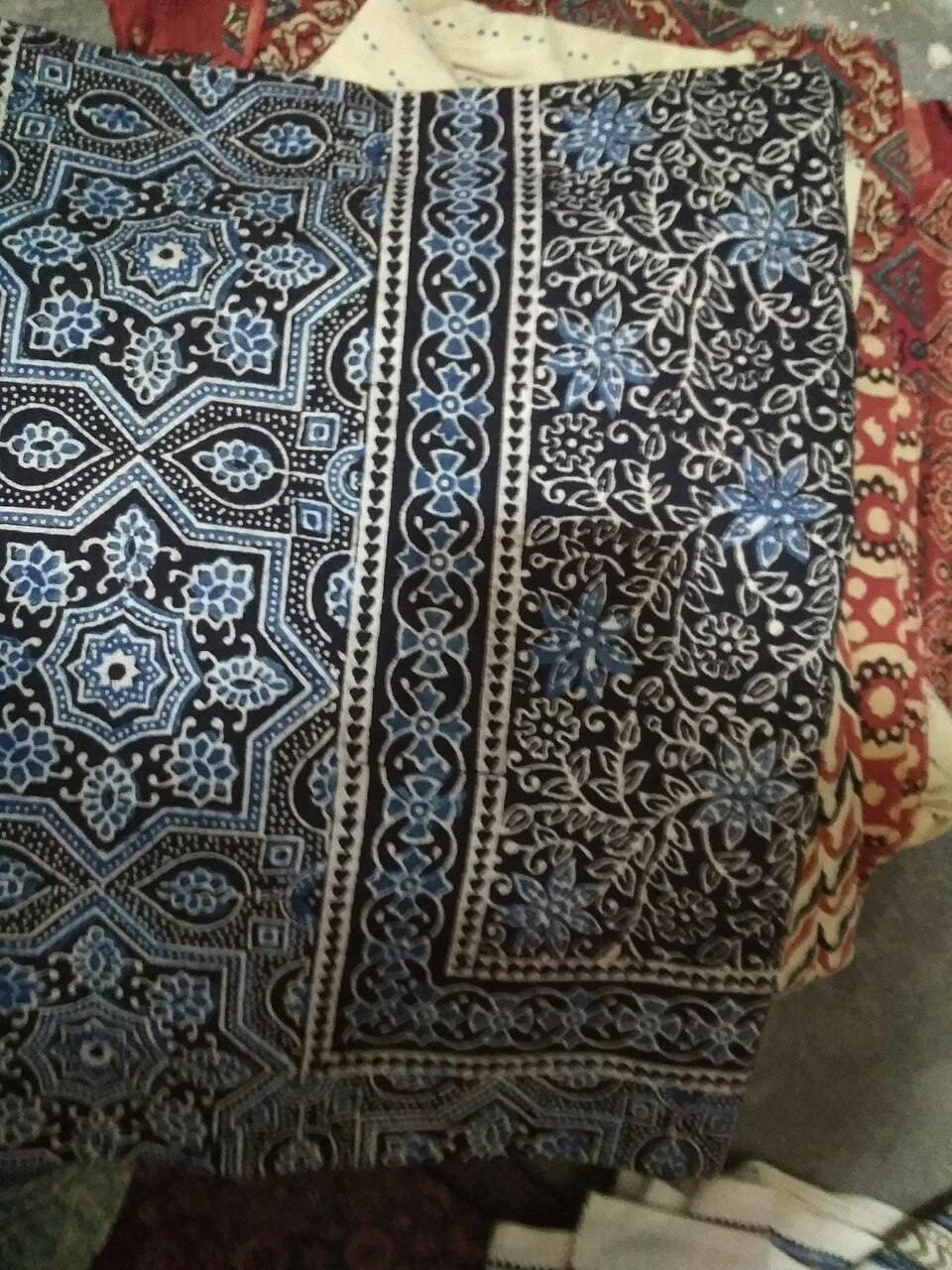 Folded Ajrakh cloth suitable for stoles and shawls